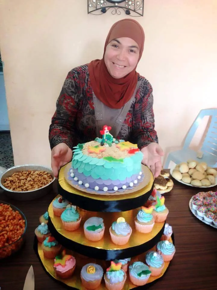 "Me and an under-the-sea themed cake." Picture taken by Samira Mashni