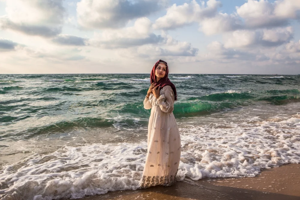 Image credit: Edmee Van Rijn Lara wears her grandmother's dress and look behind to check no one is around.