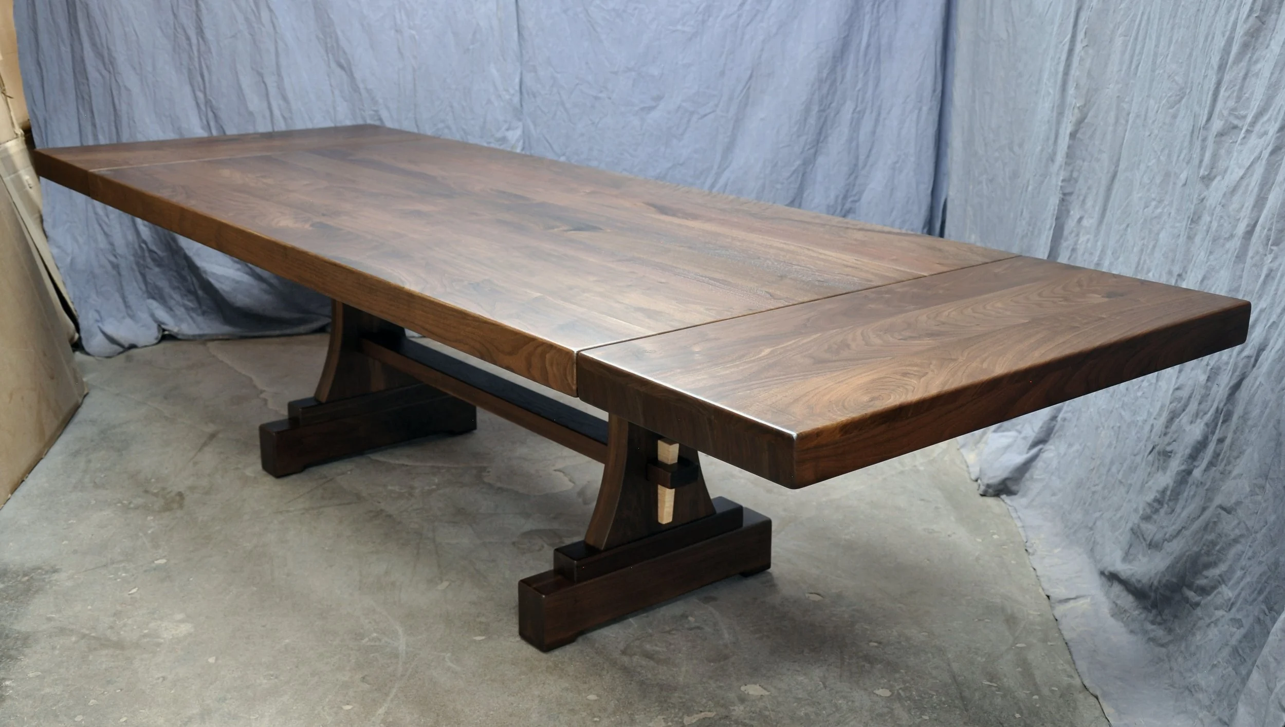 Prairie Trestle table in walnut with leaves.jpg