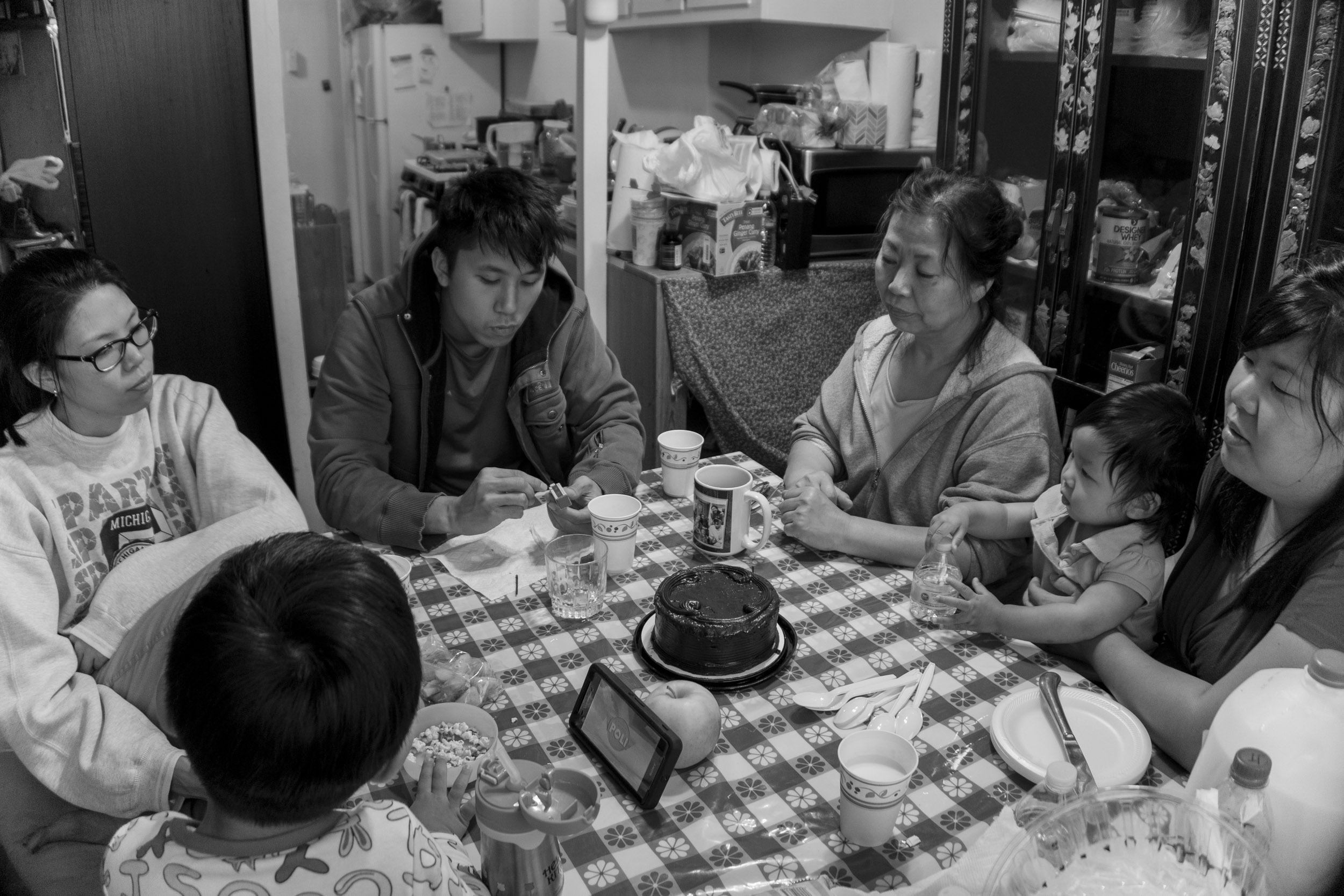  The Kim family returns home from a long day that ended with the burial of the family patriarch Chinsoo Kim, who died on 9/14/17 after a yearlong battle with lung cancer. They sit at the dining table with a small cake to lighten the mood and share me