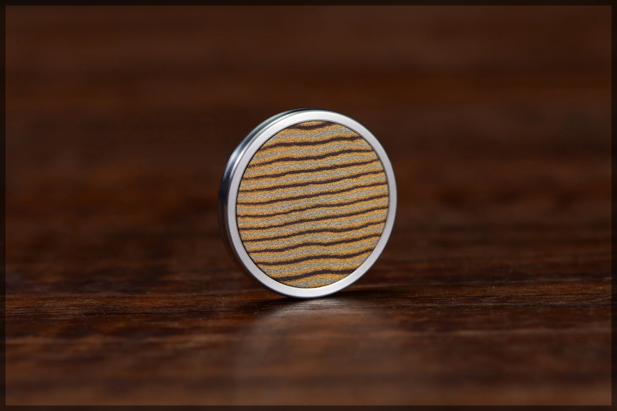 Stainless steel Gambit coin with a treated 3 Color Mokume inlay