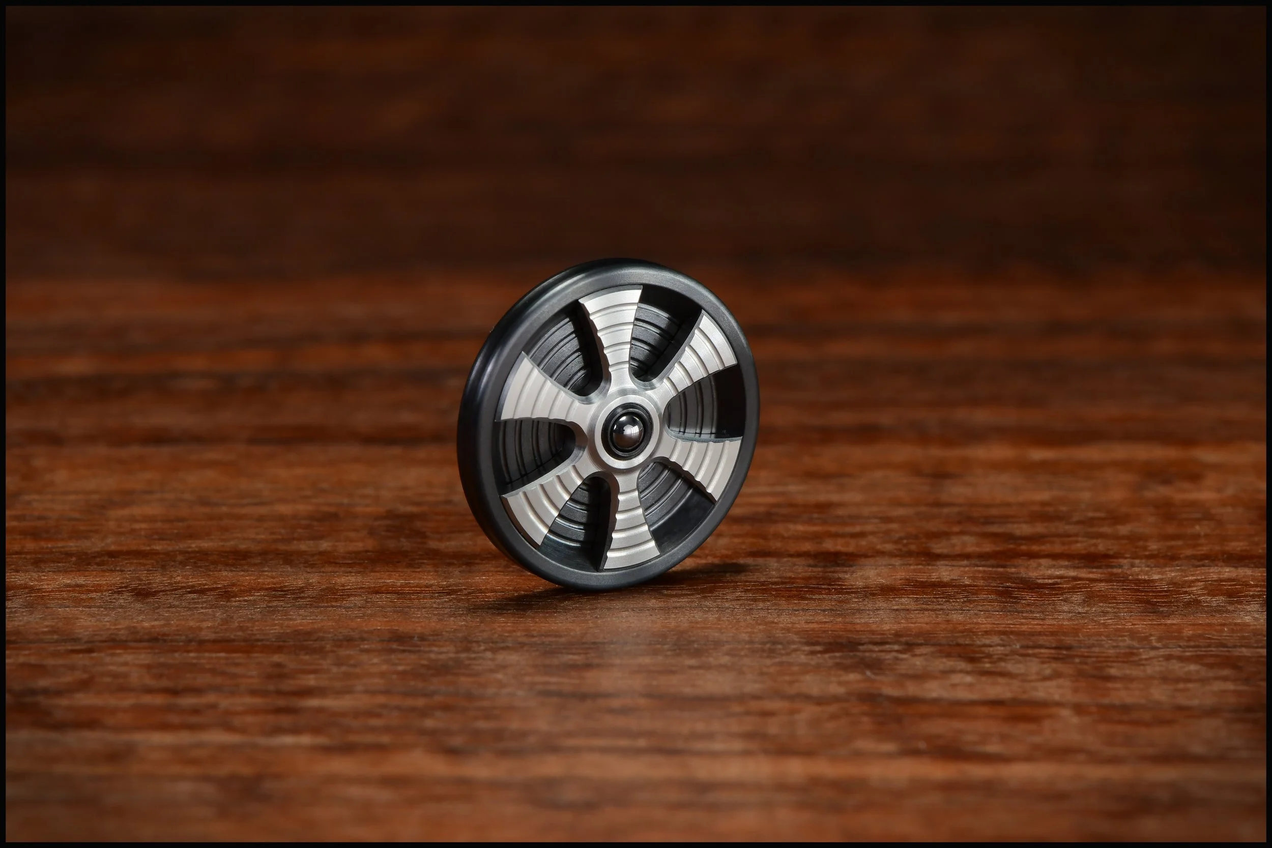 Spoked Gambit Coin- Zirc/Stainless