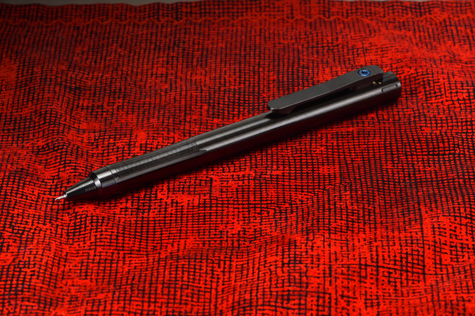 Single Energel pen on red-black fabric-1.png