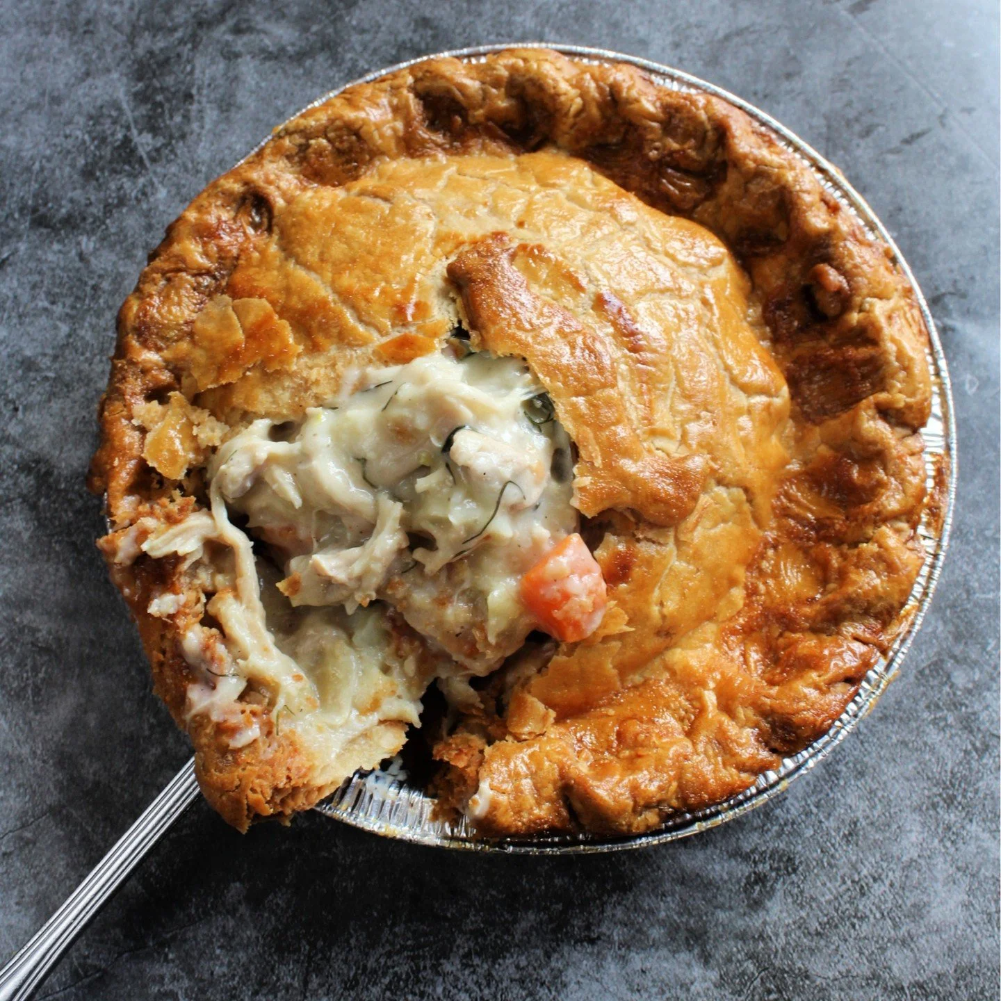 Made from scratch in our kitchen, our chicken pot pie will warm you up on these cold days. 

Find them in our freezer case, take home &amp; heat.

#chickenpotpie #comfortfood #dmv