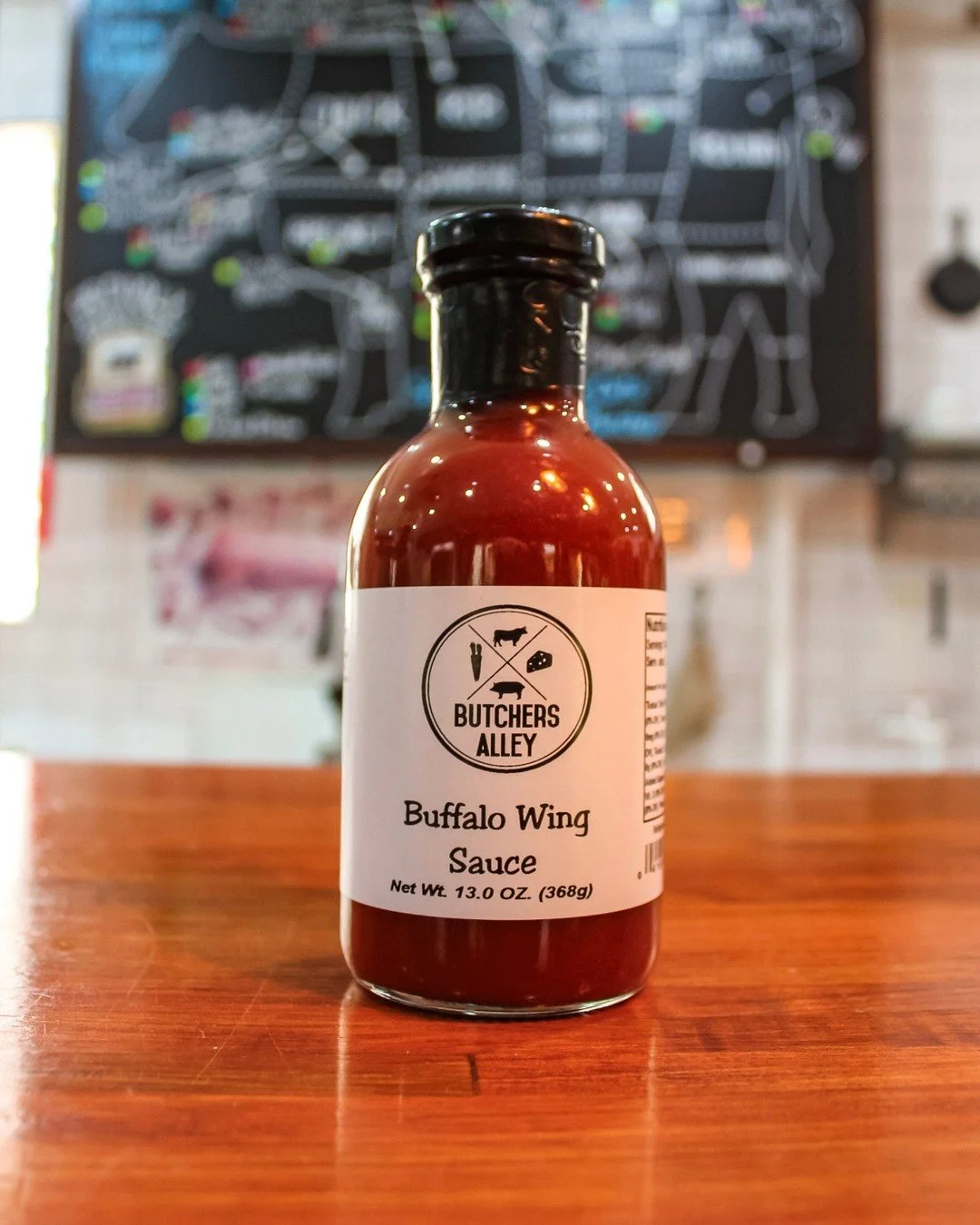 Want to give wings a try at home? We've got you covered with our House Buffalo Wing Sauce - it's tangy &amp; delicious. 

Find fresh chicken wings in the butcher case too!

#wings #bethesdamd
