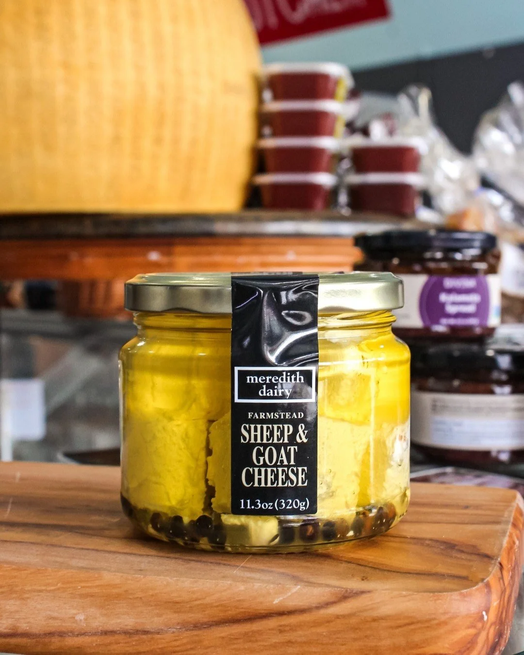 This @meredithdairy sheep &amp; goat cheese is a customer favorite around here. The cheese itself is creamy and delicious spread on our house made crostinis...

But the peppercorns &amp; oil...you can drizzle it on salads, use for marinades, the opti