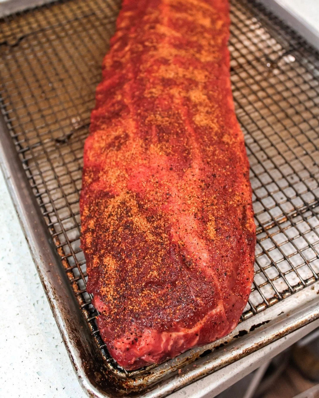 What are we making today for our 4th of July BBQ? Chef Fernando's oven-baked baby back ribs! 🇺🇸🔥🧨

Head to link in our bio for the full recipe. They are beyond good. 

Pssssst our jalape&ntilde;o cheddar sausages are on sale today too - 10% off w