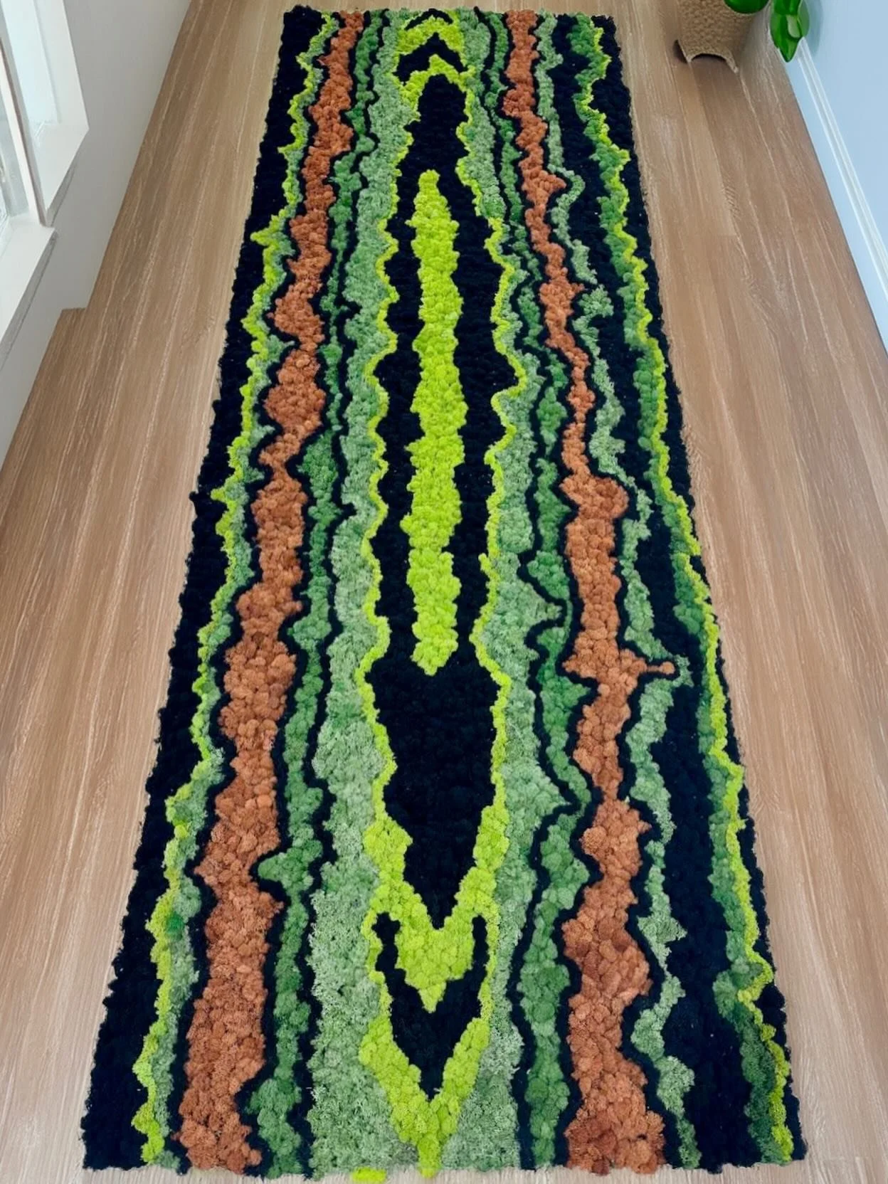 From our Agate Series, &ldquo;Fault Lines&rdquo; is ready for installation!

Layered reindeer moss creates depth and texture, while black outlines carve through the piece; adding movement, contrast, and a dramatic sense of flow. This one feels earthy