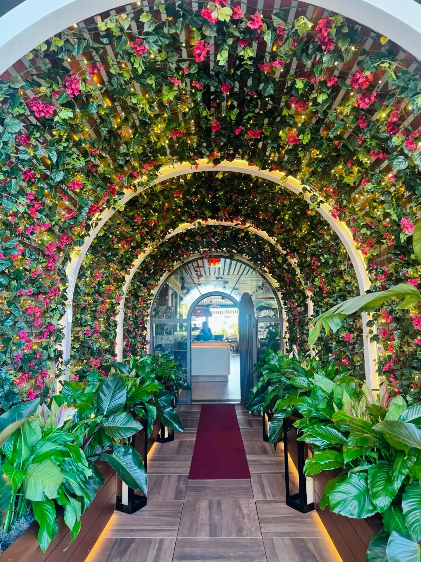 A dramatic, immersive floral entrance created with layered bougainvillea, rich in color and lush texture. Fun fact, we used 570 linear feet of bougainvillea - that&rsquo;s longer than one and a half football fields! 🌸🌿
@delmarfortlauderdale 

#plan