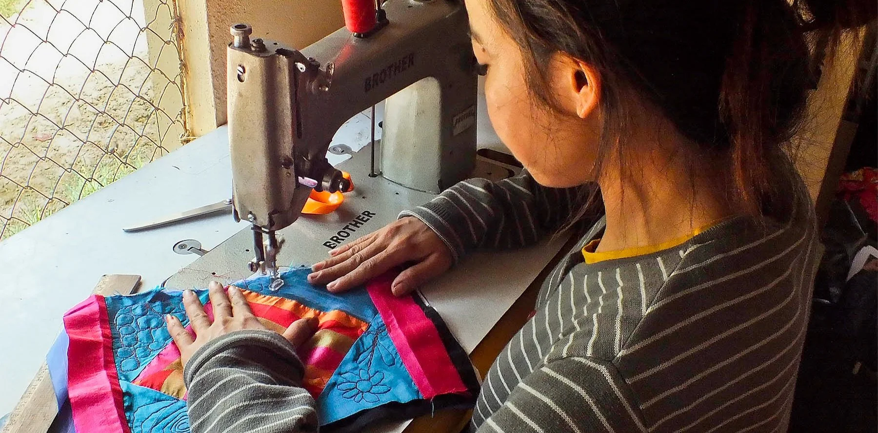 DSCF4940-woman+at+sewing+machine-4x6%5B3762%5D.jpg