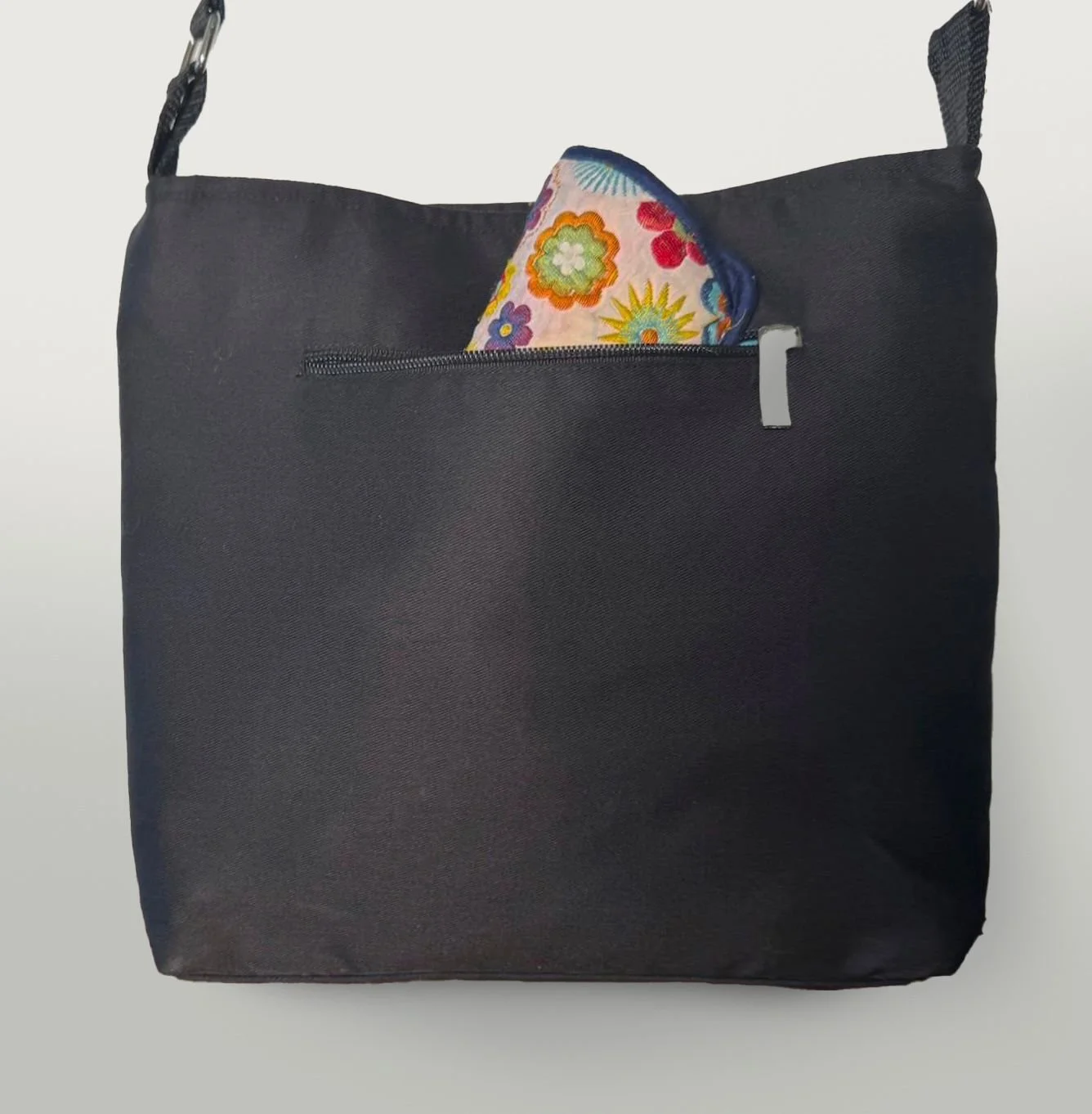 striped bag- back with glasses.jpeg