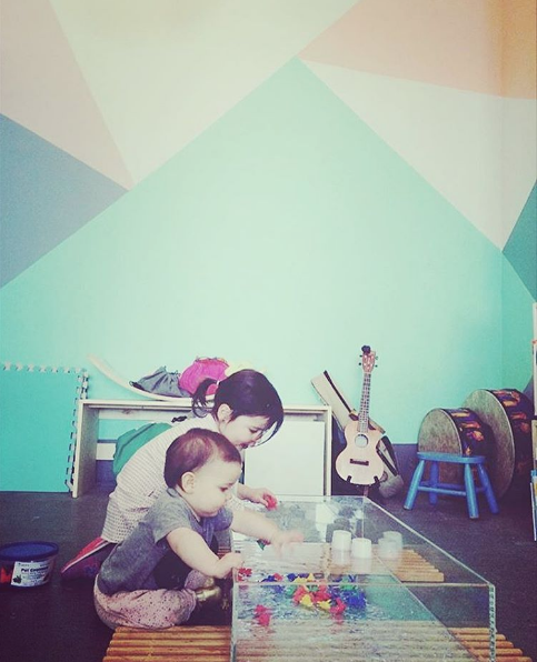 Sister love! Exploratory play in our custom water table.
