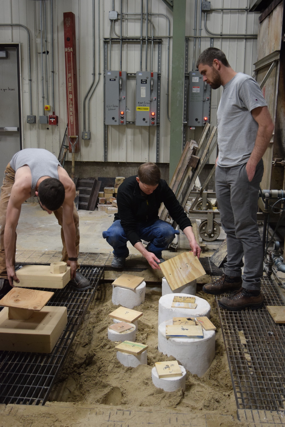  Setting up the molds with the pour team. 