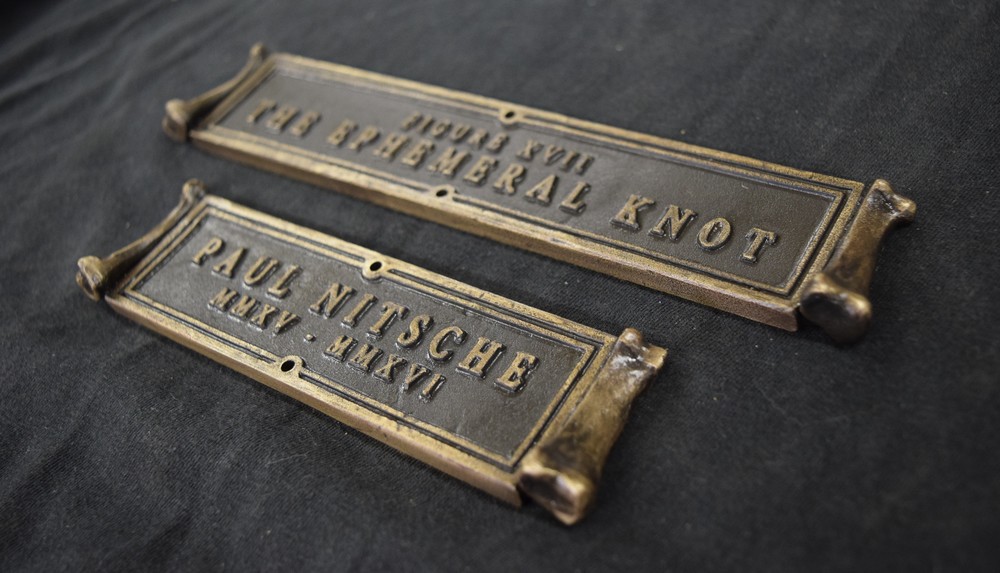  The bronze title and name plates for The Ephemeral Knot. 