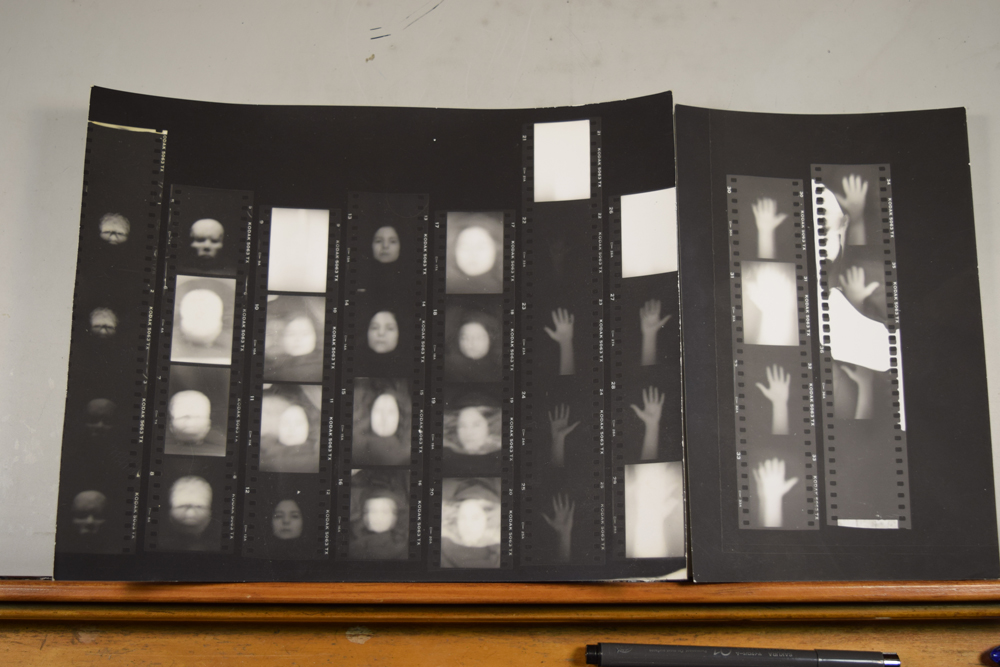  The original 35mm contact proof sheets for Dazzling Killmen's Face of Collapse. The first two strips show a clay head I sculpted. Strips 3-5 show Anna Cimini in different poses with varied lighting and exposures. Strips 6-9 show different experiment