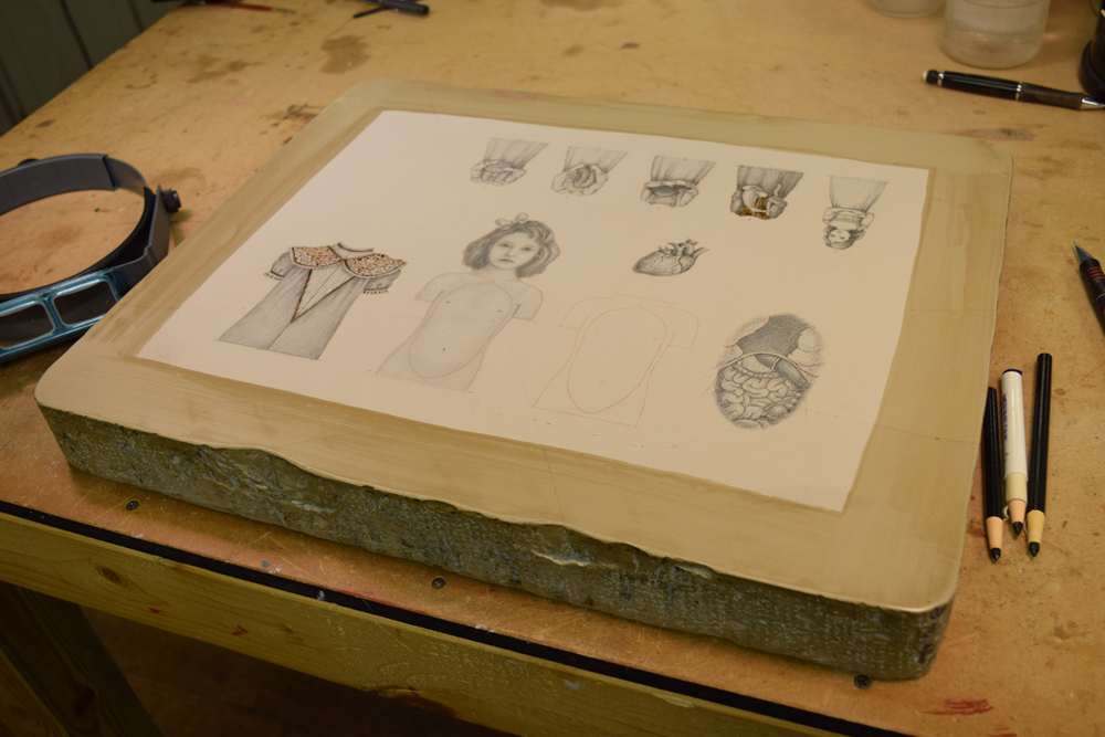  The lithography stone with finished drawings for two upcoming automata,  The Four Humors  and  Cardiomegaly . 