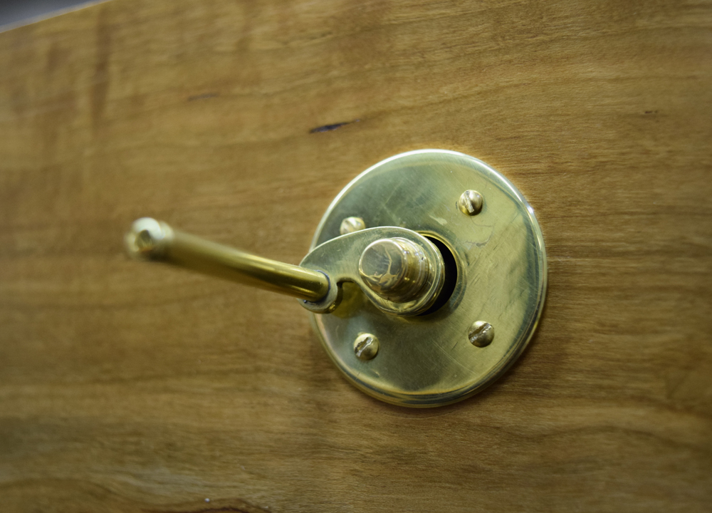  The Four Humors, Brass Crank Detail. 