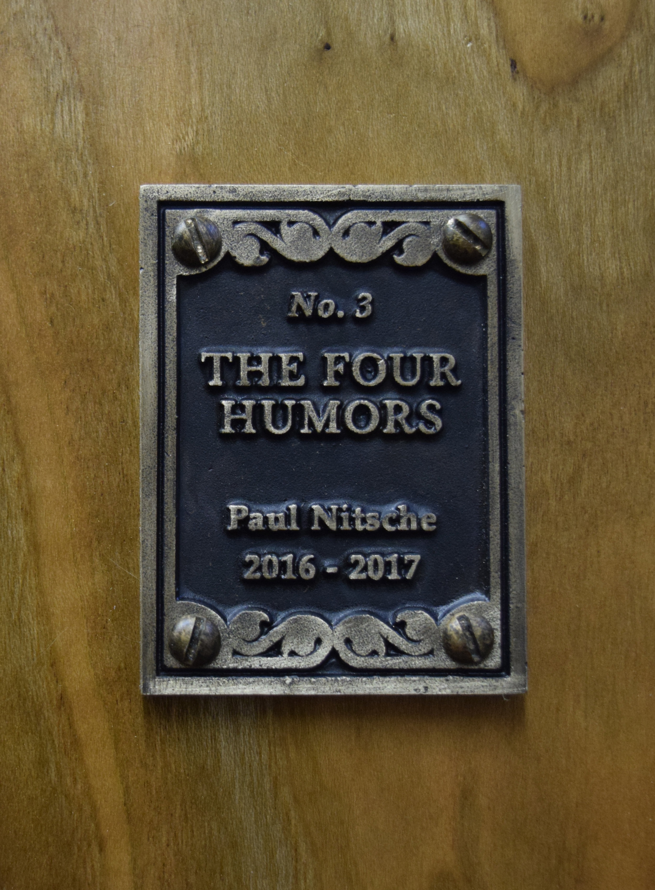  The Four Humors, Bronze Plate Detail. 