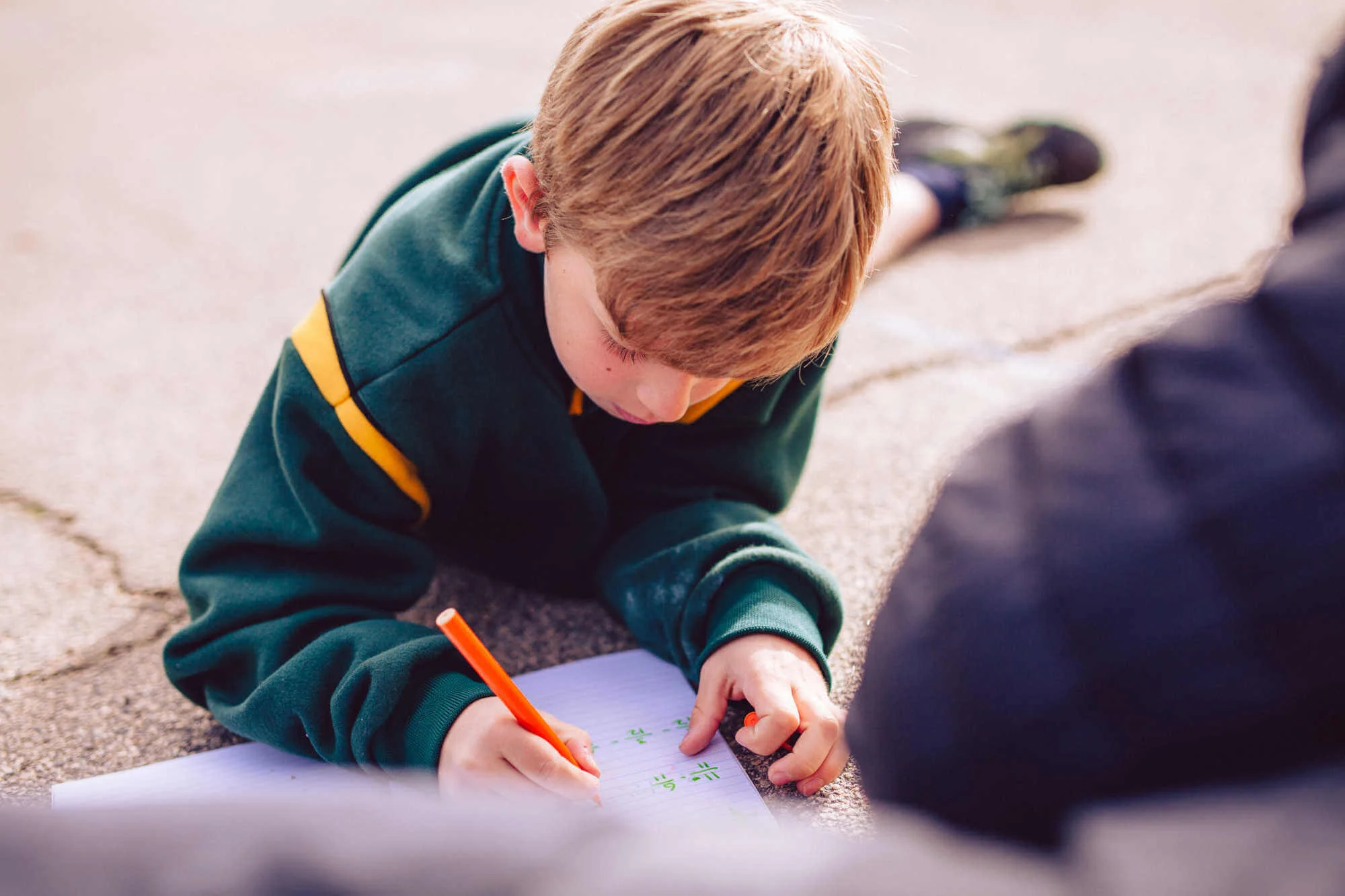 student-tutoring-outside.jpg