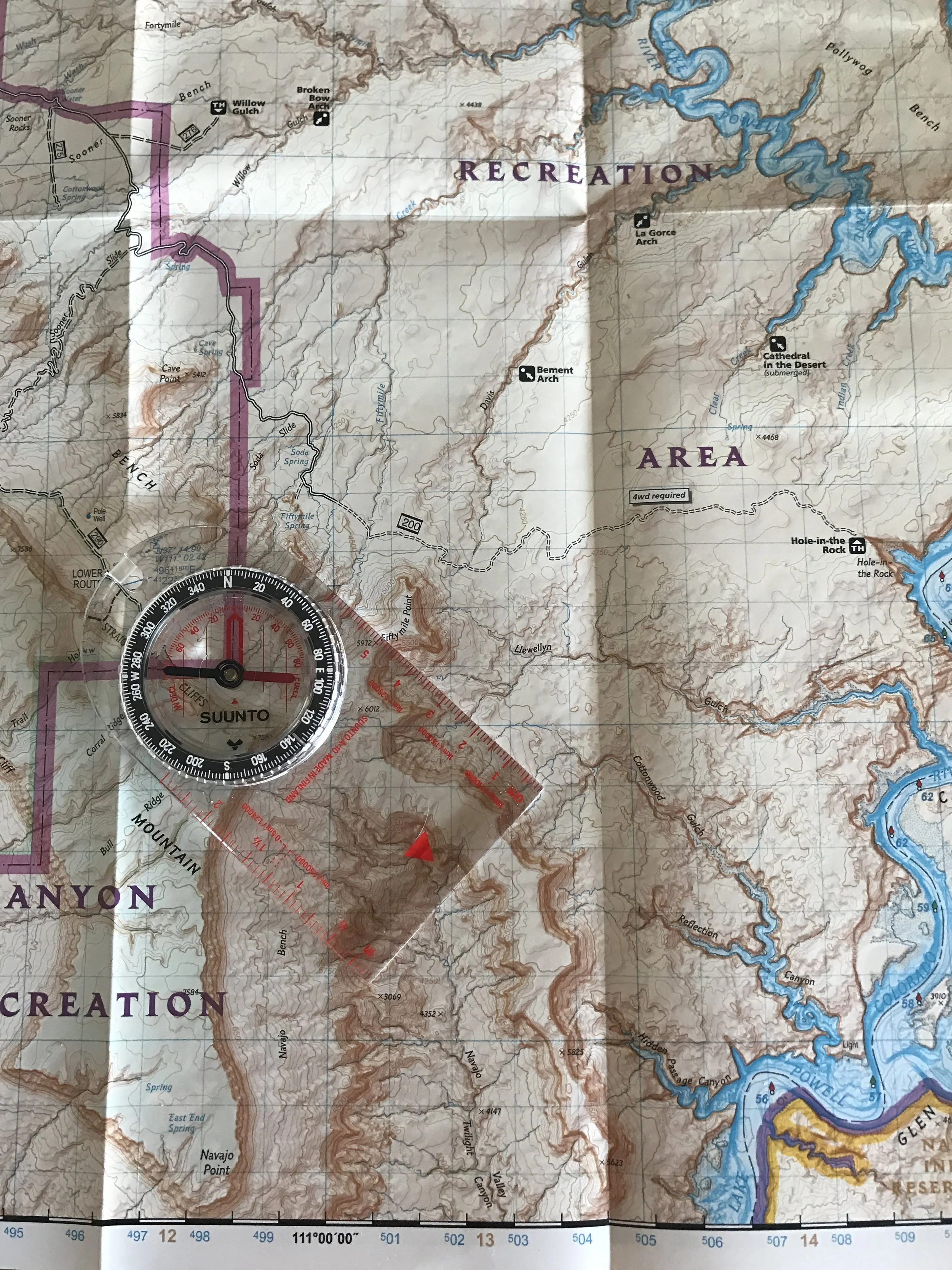 Map and compass is a great way to navigate. I picked up this map of the Escalante National Monument for $13 at REI. Well worth it!