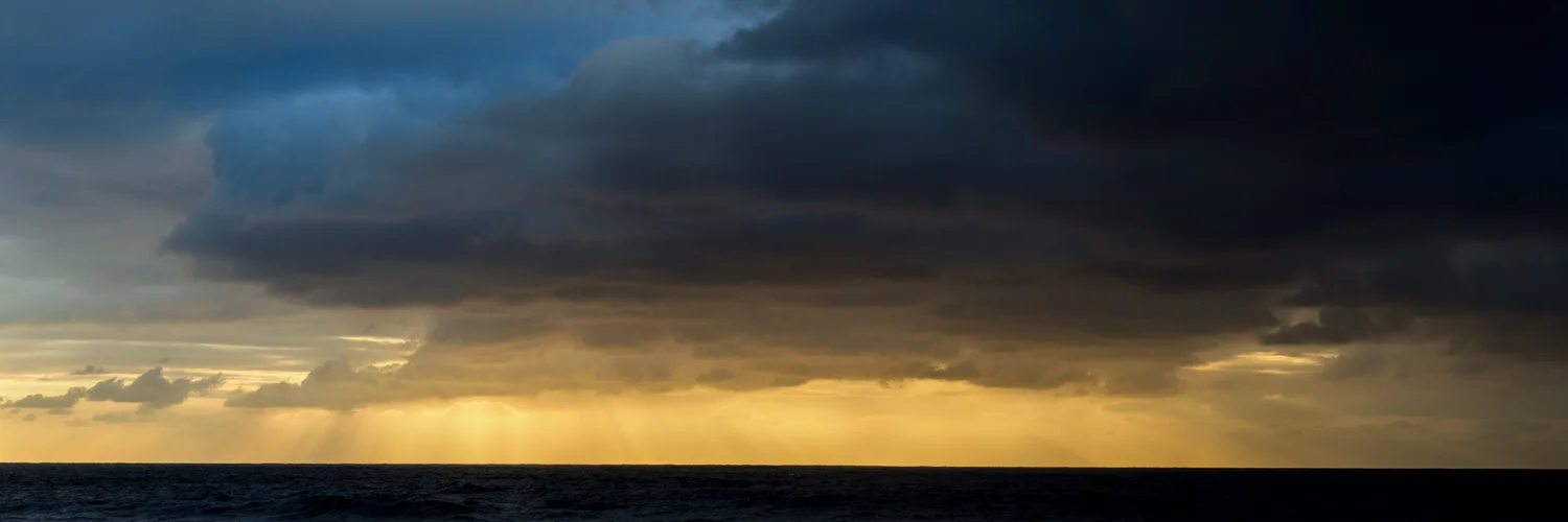 Sun rays trying to fight through the storm that rolled in.