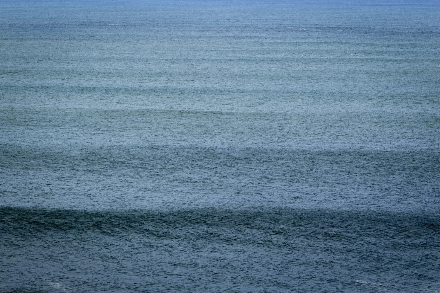 Swell stacked up to the horizon.