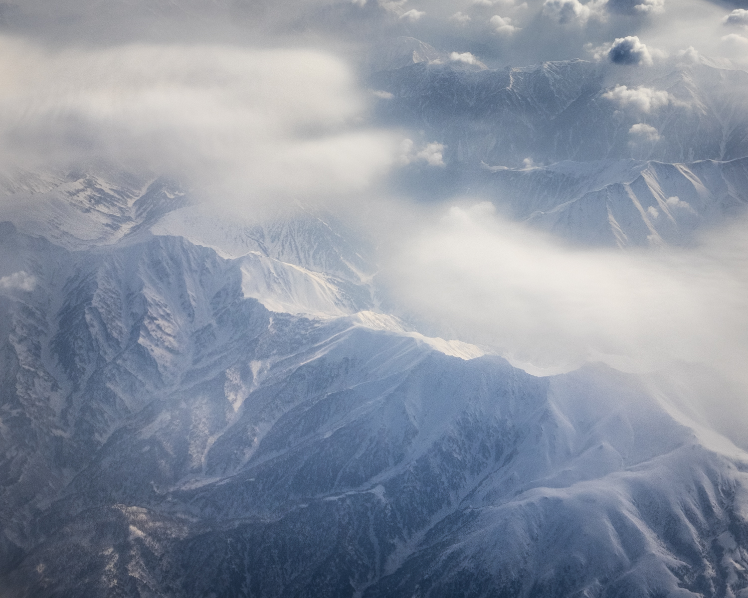 Flying over mountains on the way home.