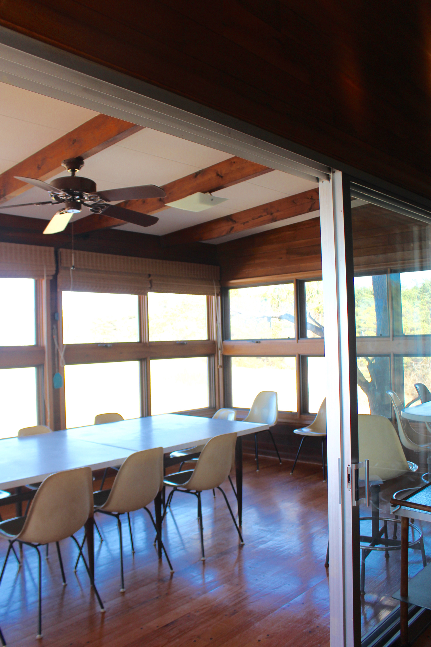 Porch dining room for entertaining large groups of relatives, friends and business associates.