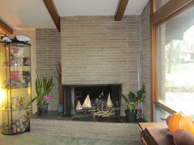 Burgess House stone fireplace and beamed ceiling 