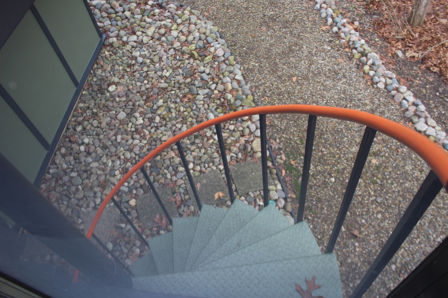 CIRCULAR STAIR FROM DECK DOWN TO BACKYARD