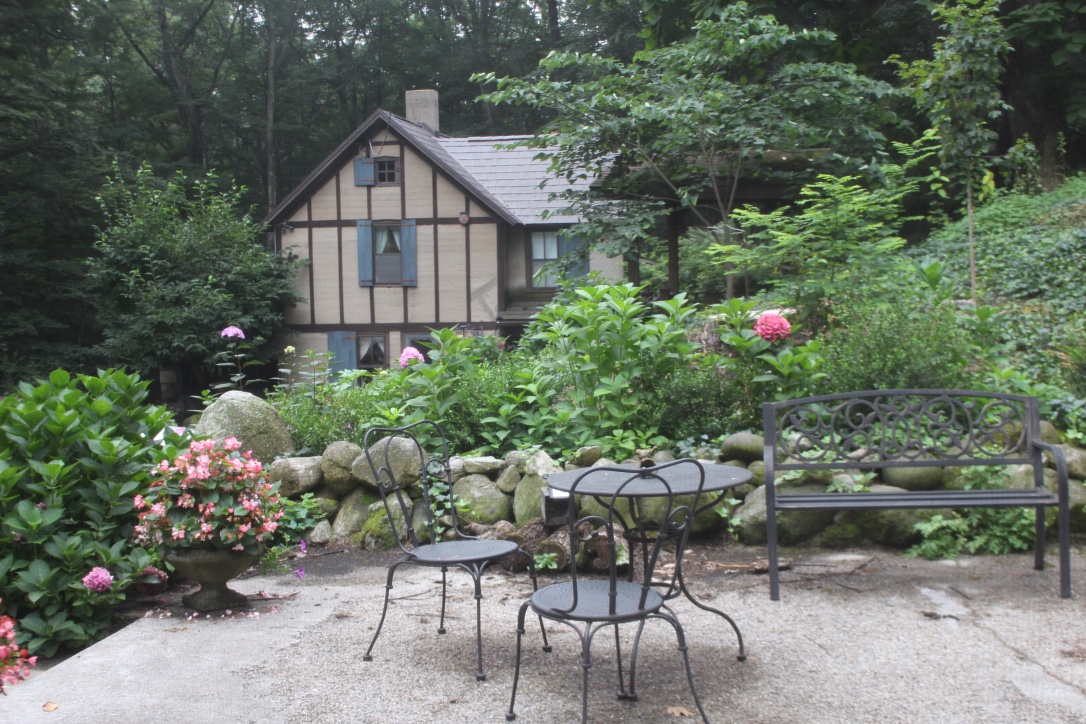 Beautifully landscaped patio overlooking the house