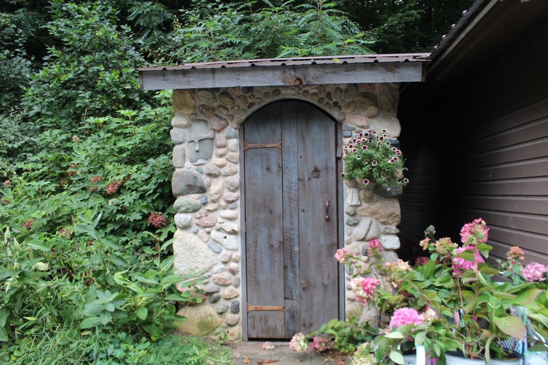 Outhouse replicas the beauty of the old home but is actually new and was designed for an outdoor wedding