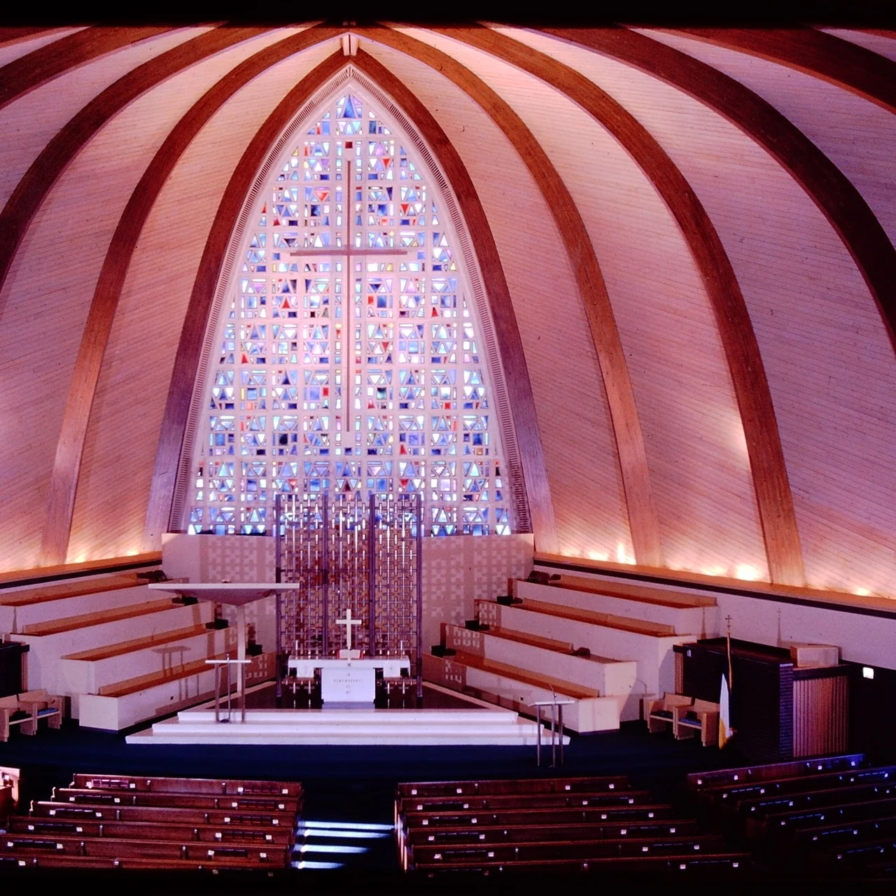 Interior with monumental stained glass window by Gerda Elisabeth Firant, Christian Catholic Church, Zion Illinois. Early slide photo from Firant family archive. .