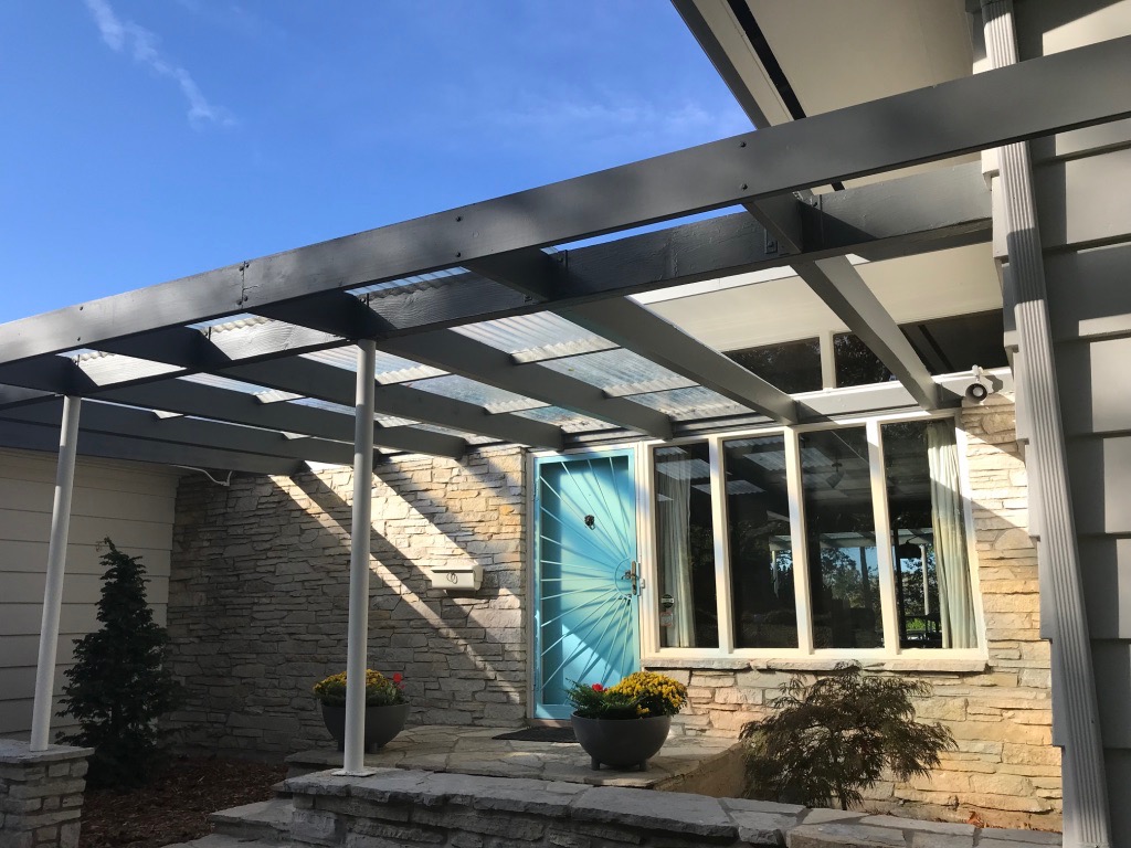 TURQUOISE FRONT DOOR WITH PERGOLA