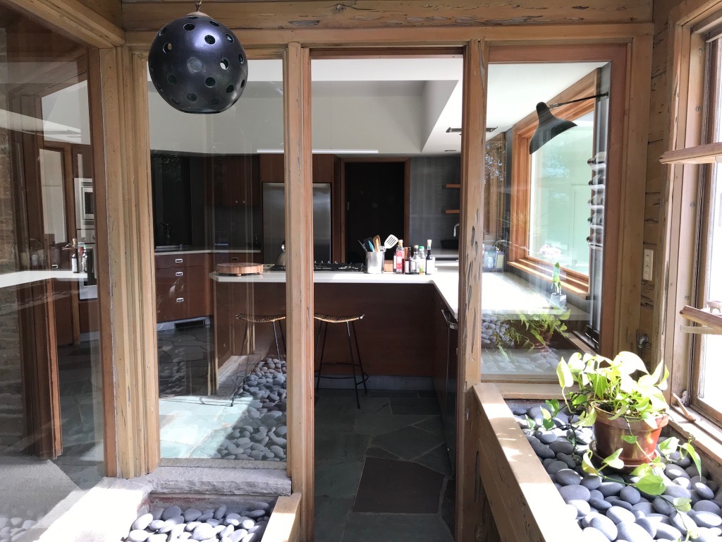 PLANTERS IN THE GREENHOUSE, LOOKING INTO THE KITCHEN