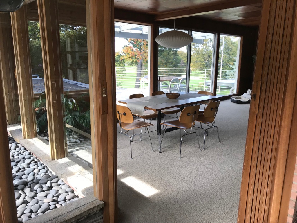 VIEW TO DINING FROM KITCHEN ENTRY