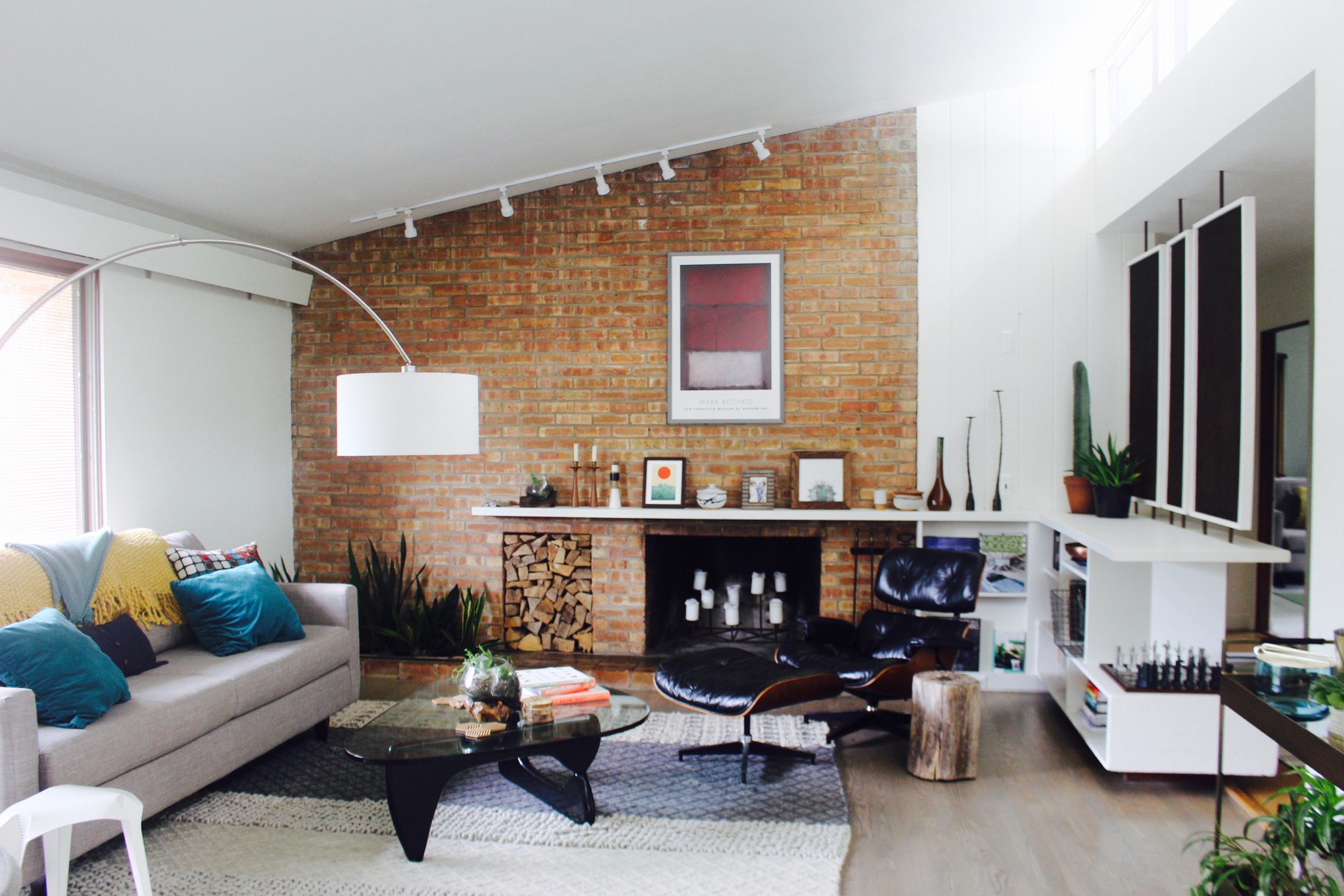 LIVING ROOM FIREPLACE AND ANGLED CEILING