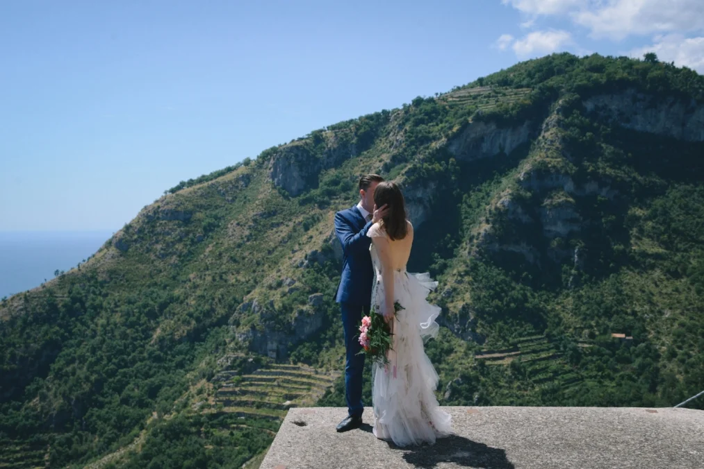 Well Travelled Bride Amalfi Elopement Kelsey Genna David Palfreyman Kiss.jpeg