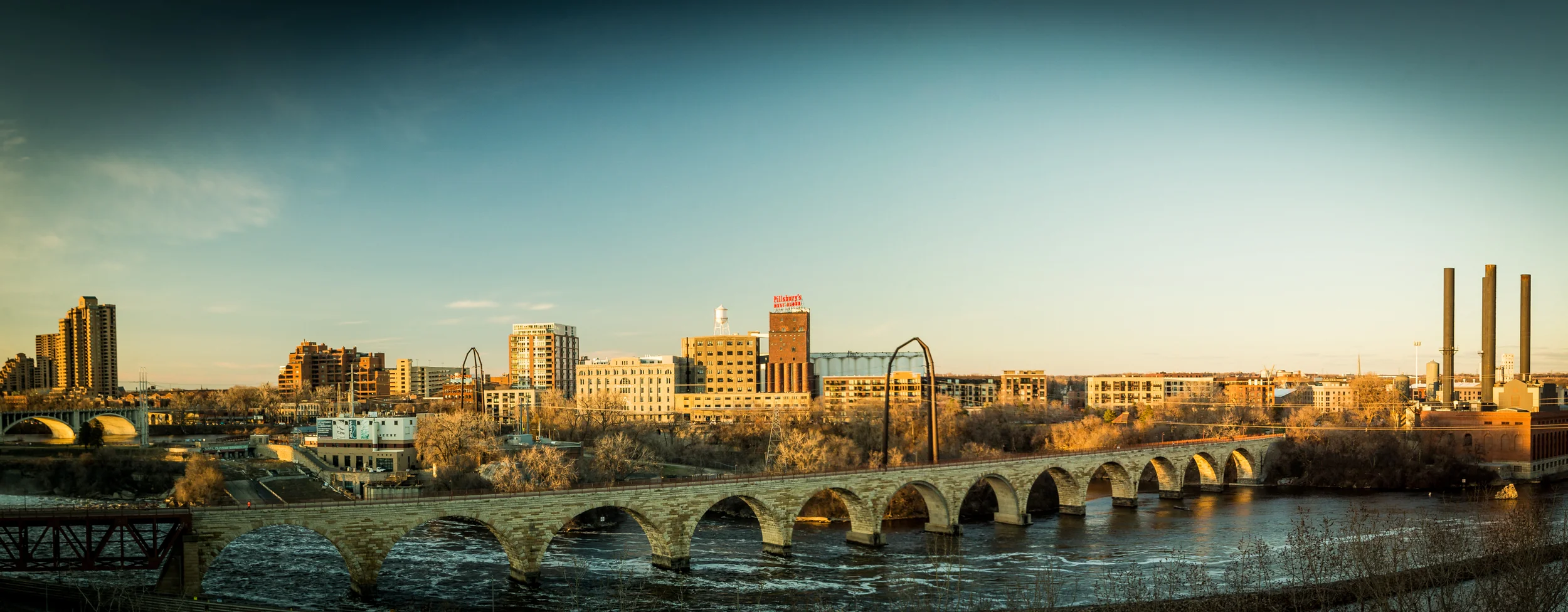 St. Anthony Falls. Taken from the Endless Bridge at the Guthrie Theater. 1/100 sec @ f/7. w/ ISO 400. 35mm 2 Image Panorama