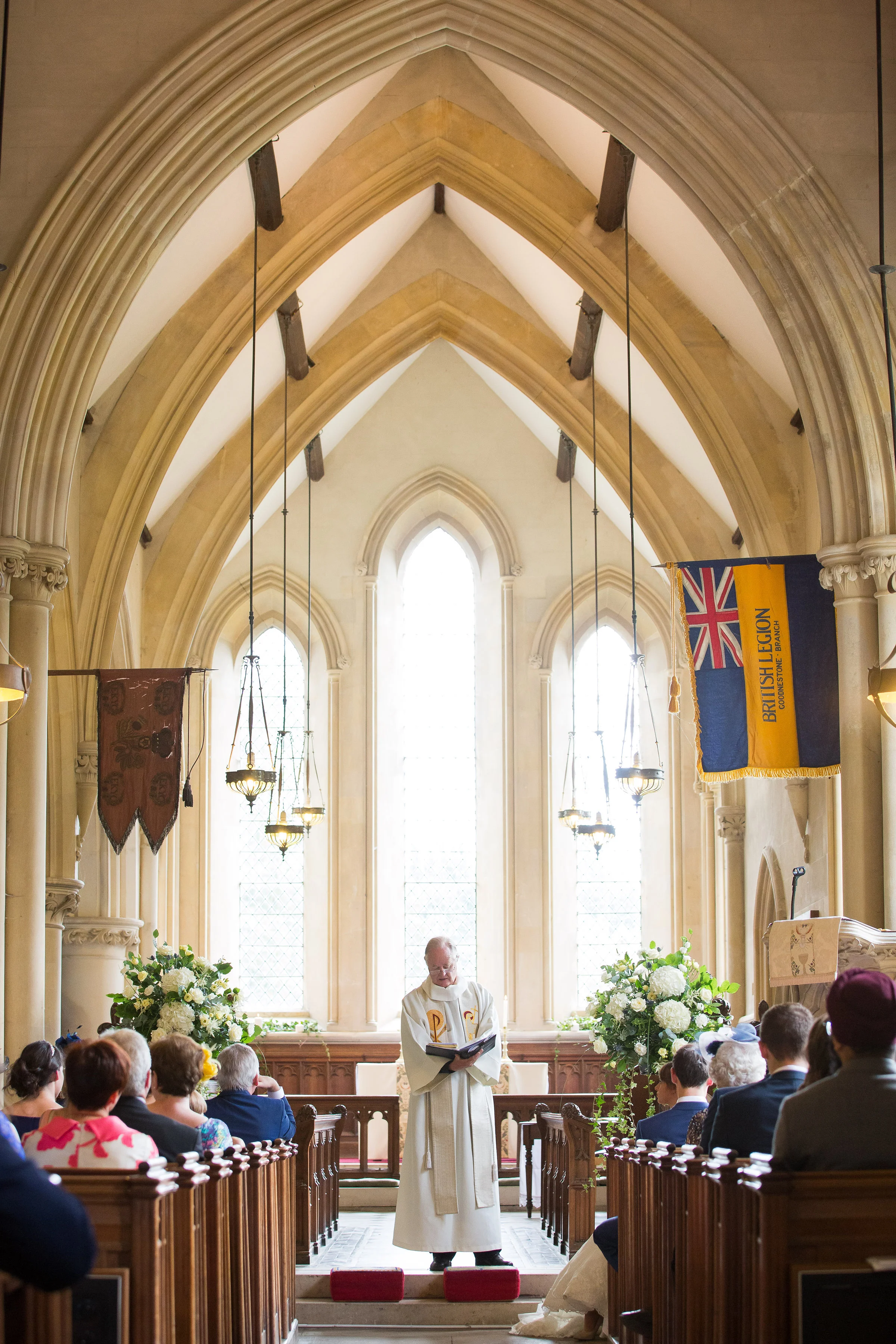 The Vicar Gives a Reading - Knowlton Court - Kent Wedding Photographer