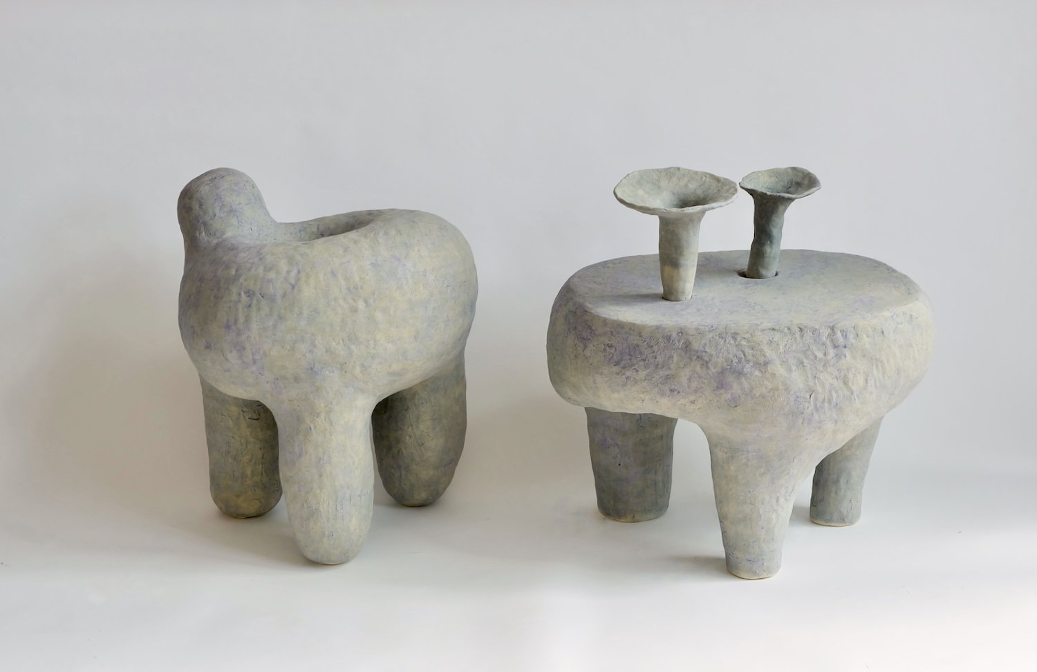 Hookey, 2024. Ceramic, 20.5 x 17.5 x 16.5 inches (52 x 44 x 42 cm). Table for Two Icecream Cones, 2024. Ceramic, 21 x 21 x 18 inches (53 x 53 x 46 cm)