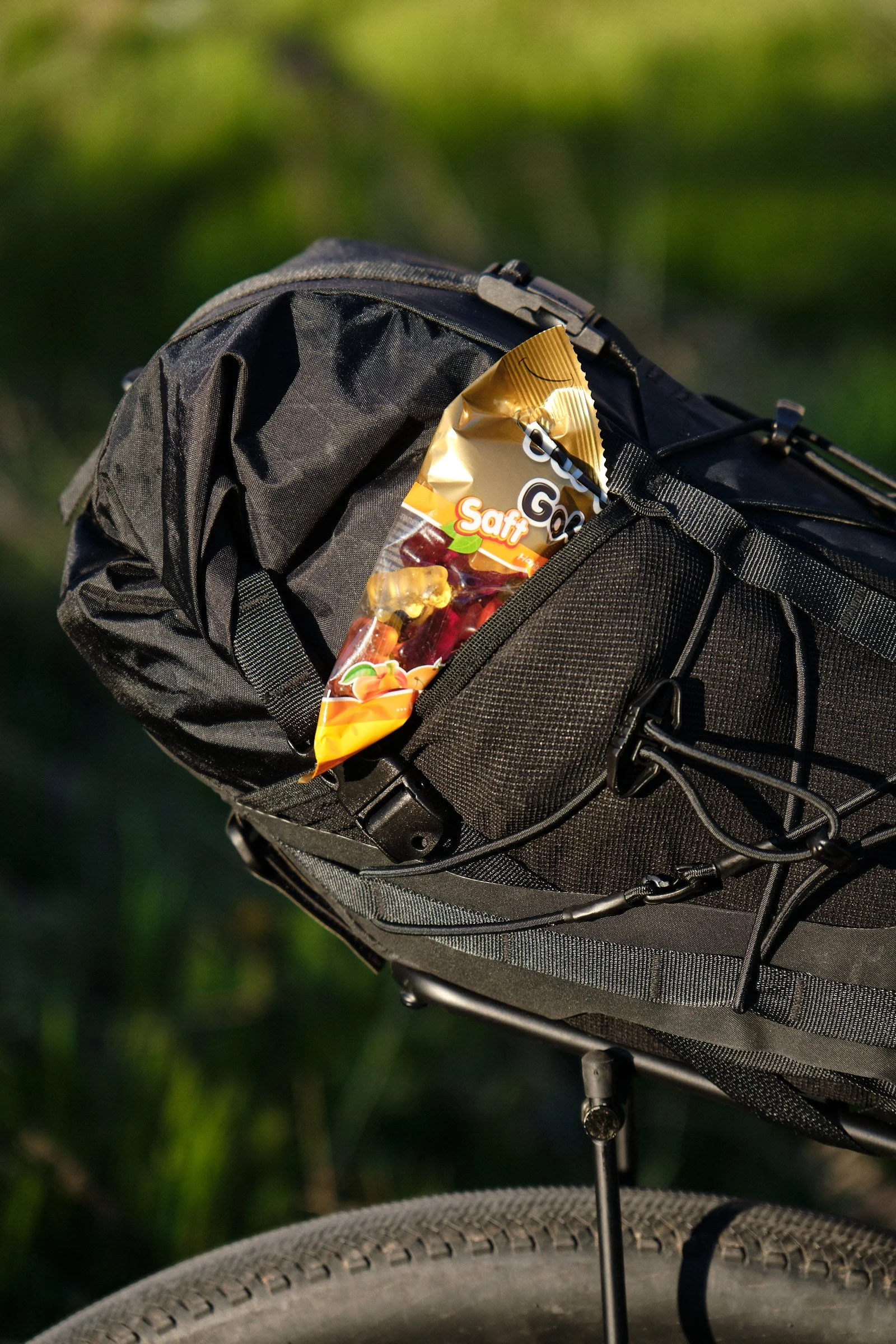 Stretch side pockets and shock cord