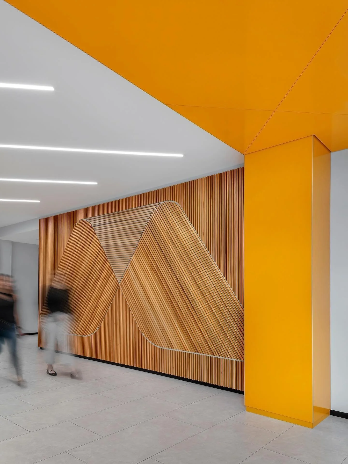 Close-up view of Modisoft&rsquo;s wooden logo wall in their staff lounge area! We wanted to tell Modisoft&rsquo;s story and the evolution of its brand throughout its office. This accent wall is just a small snippet of what makes Modisoft&rsquo;s spac