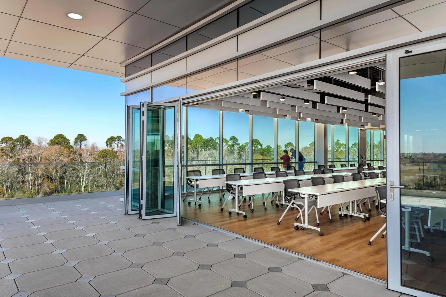 Castle Bioscience&rsquo;s fourth-floor terrace is designed for outdoor collaboration and an overflow gathering spot for the adjacent to a 48-seat training center. The terrace wraps around the half of top floor of the building allowing work to flow ou