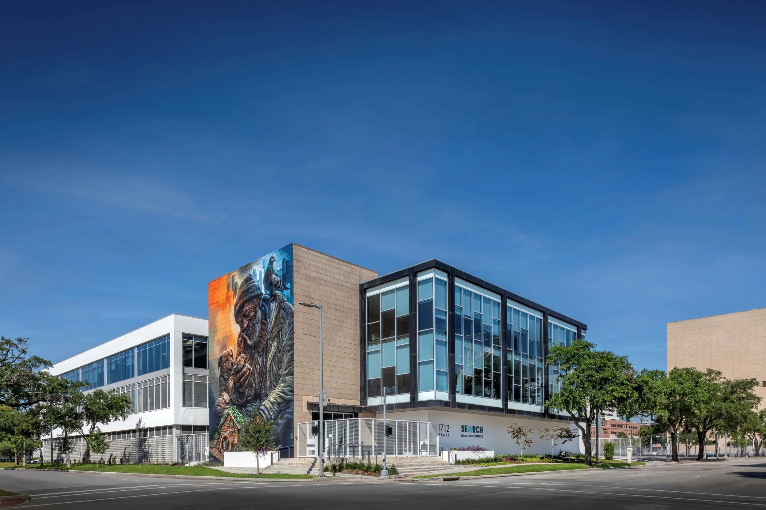 Located in Downtown Houston SEARCH Homeless Services new 53,000 SF home 📸

TDS designed the building as a blend of adaptive reuse and new construction. The two buildings connect through bridges. Conference rooms line these bridges with dynamic light