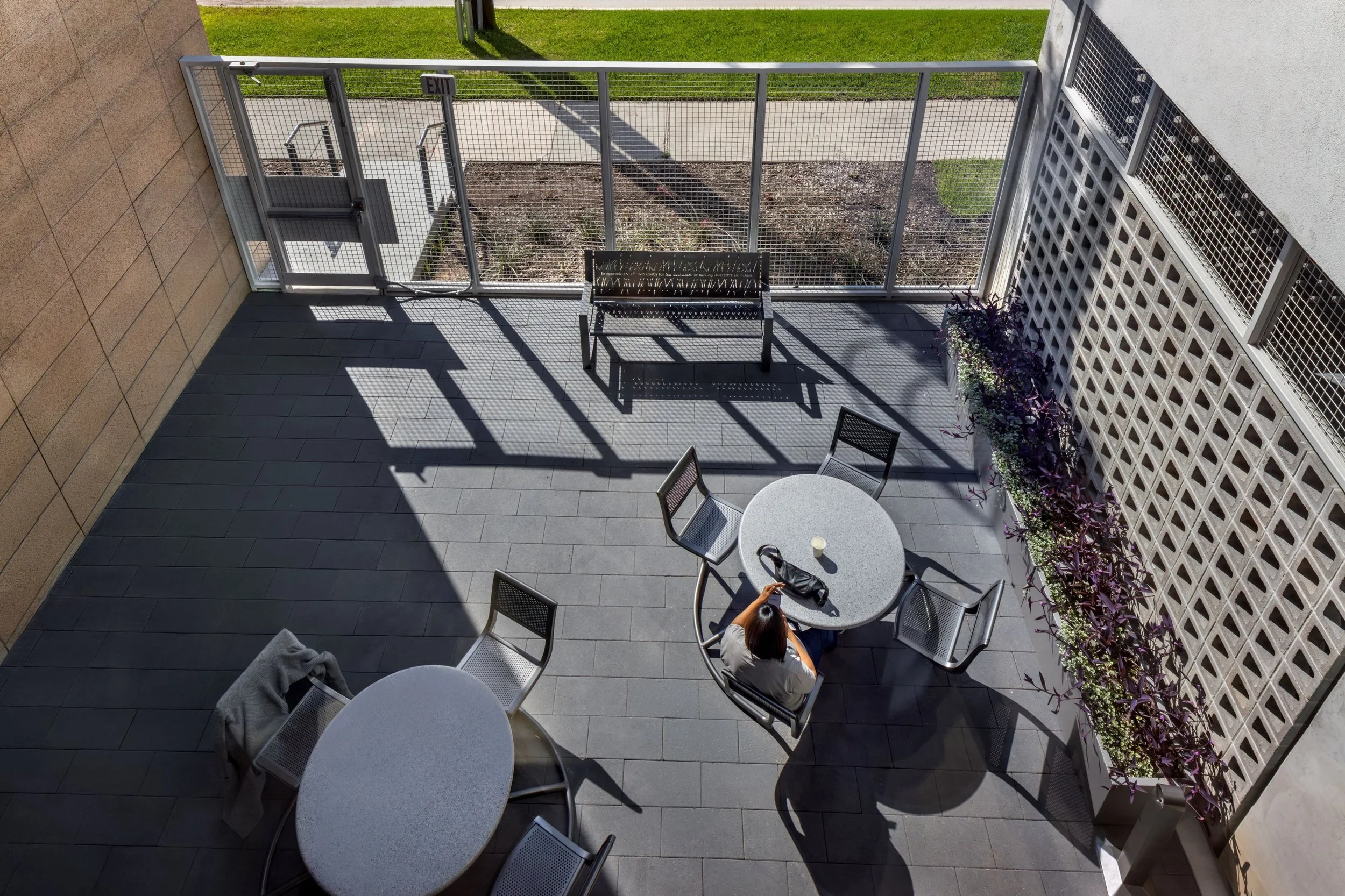 A thoughtfully designed exterior is just as essential as the interior design in supporting employee wellness. SEARCH Homeless Services&rsquo; office features two outdoor patios, giving staff and clients the option to step outside pause, recharge, and