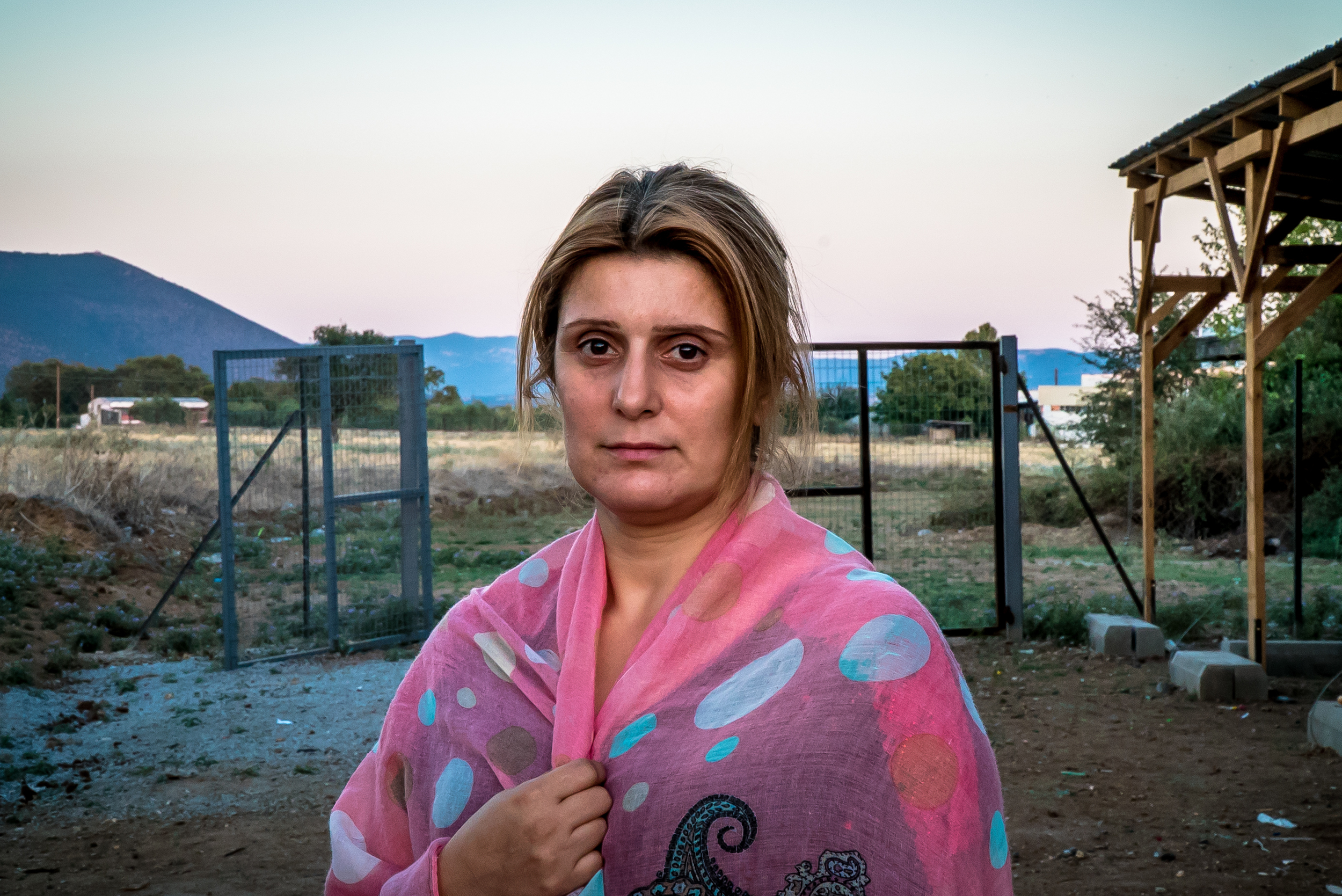 Photo taken 8/14/16. Hevin, a widowed single mom and former arts teacher in Vasilika Camp. She's been here for 2 months with her 3 children. With the current political policies in place, she can neither move forward across the border to get to Germany where she had hoped to work, or go back. 