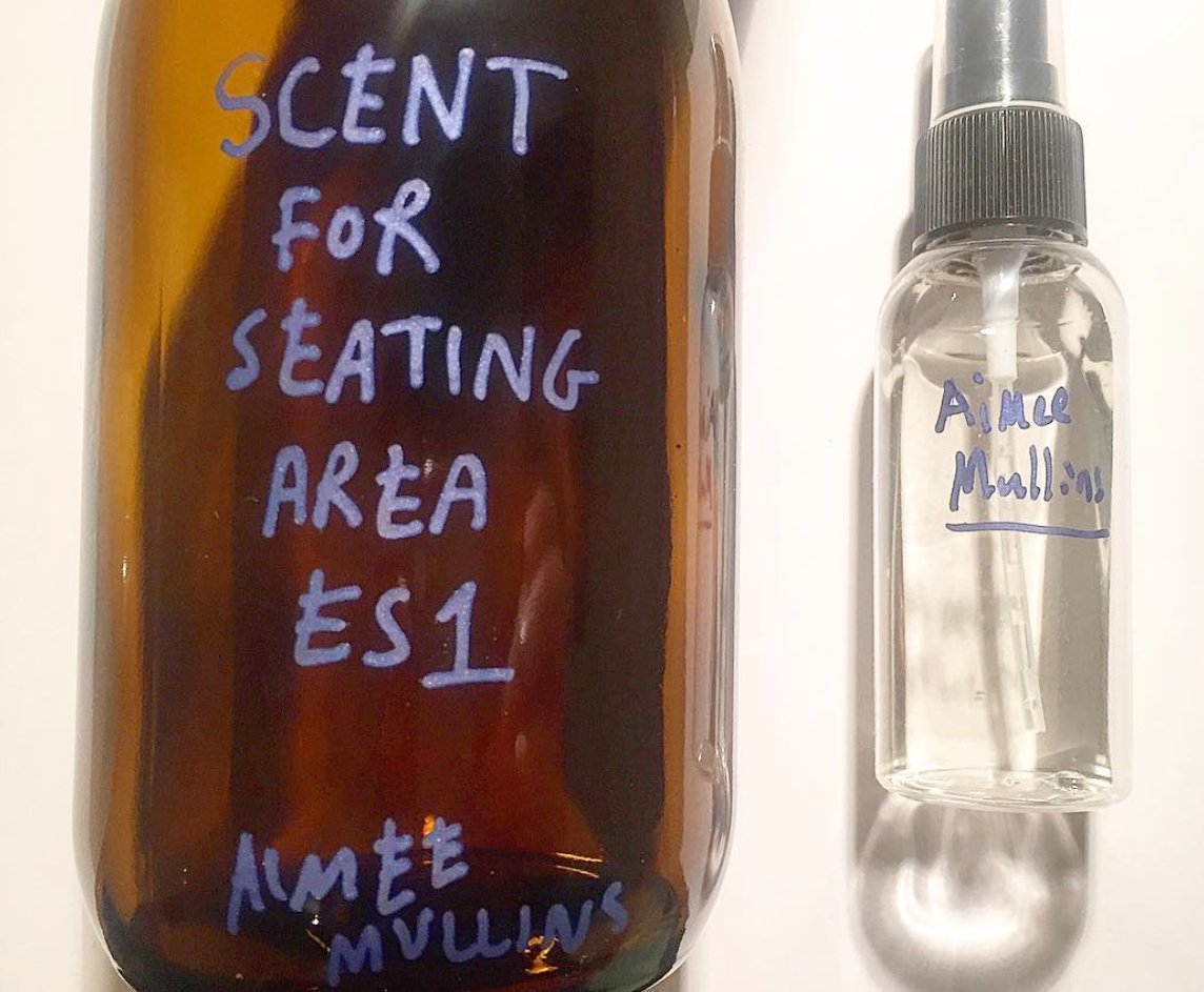 The pine scent provided by Aimee Mullins is decanted into small plastic bottles for staff to spritz