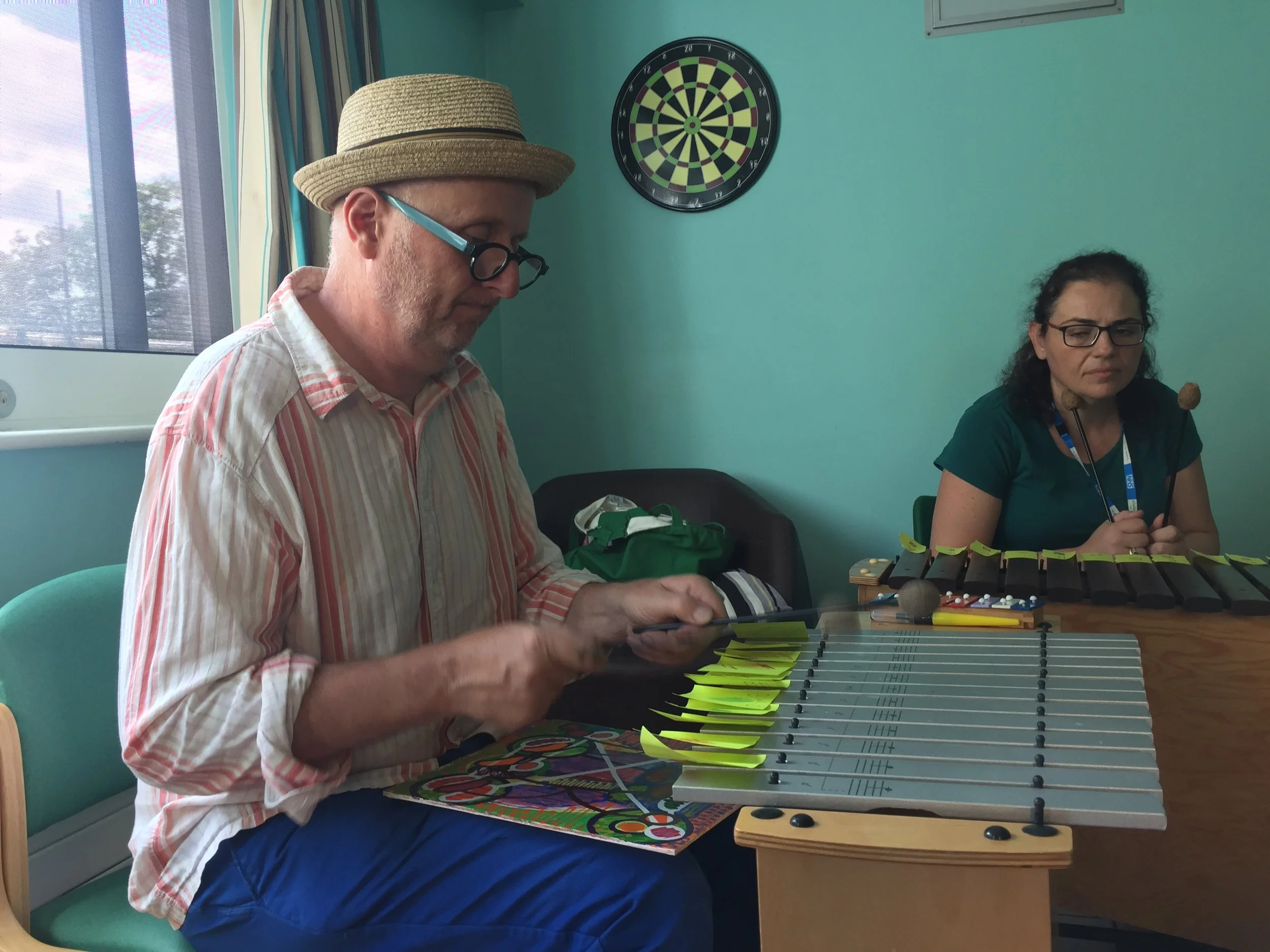 Bob and Roberta Smith in the music and art workshop he led for residents at Bluebell Lodge. We are grateful to musical therapist Pavlina Papadopolou who helped make the workshop possible and also took part.