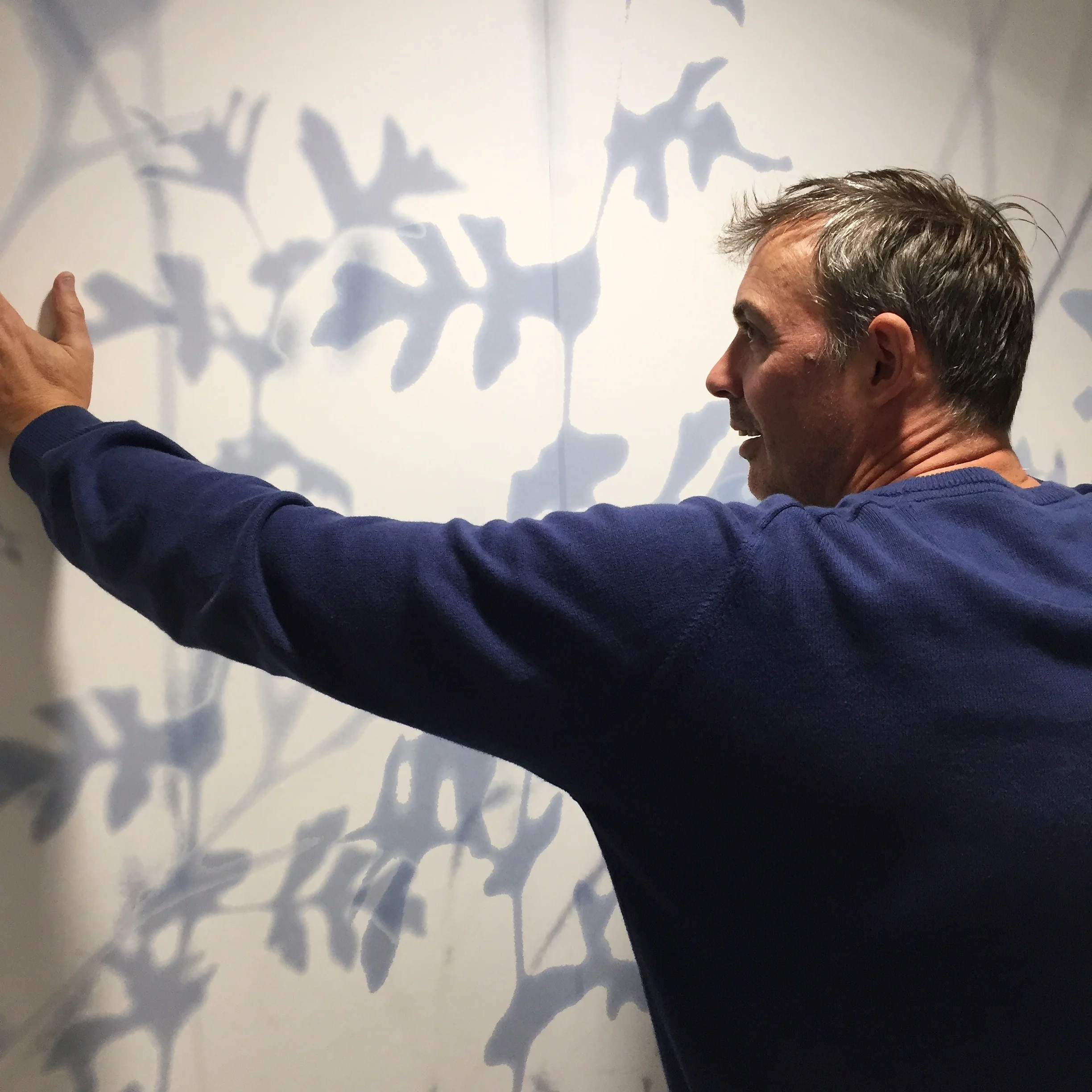 Steve Macleod installing his work in the Gym at Bluebell Lodge.
